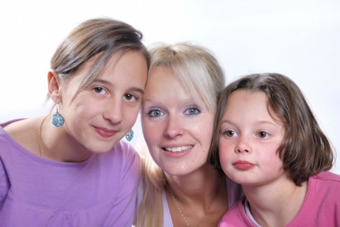 A mother and her young daughters