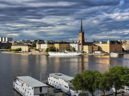 View from the viewpoint Monteliusvaegen to the island Riddarholmen, old town Gamla Stan, evening light, Stockholm, Maelaren, Sweden, Europe
