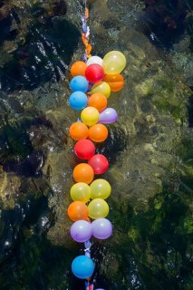 Balloons in shooting range as targets on water