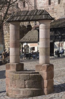 Historical draw well, Tirgaertnertorplatz, Nuremberg, Middle Franconia, Bavaria, Germany, Europe