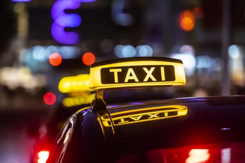 Taxi stand with taxi in the city centre at night, symbol photo, Stuttgart, Baden-Wuerttemberg, Germany, Europe