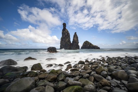 Long exposure, beach with volcanic rock, rock formation Ilheus da Rib and Ilheu da Ruama in the sea, Praia da Ribeira da Janela, Madeira, Portugal, Europe