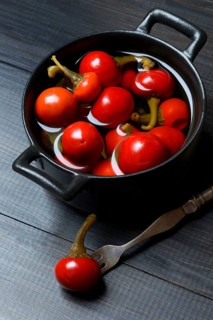 Potted cherry peppers in vinegar, chilli, paprika