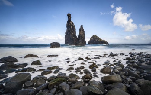 Long exposure, beach with volcanic rock, rock formation Ilheus da Rib and Ilheu da Ruama in the sea, Praia da Ribeira da Janela, Madeira, Portugal, Europe