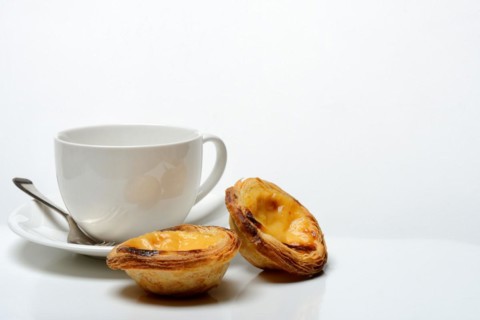 Pastel de Nata, Pasteis de Nata with coffee cup, custard tart, Portuguese speciality