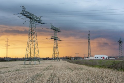 Thunderstorm cell at sunset, high voltage pylons, construction container, Suedostlink construction site, Wolmirstedt, Saxony-Anhalt, Germany, Europe