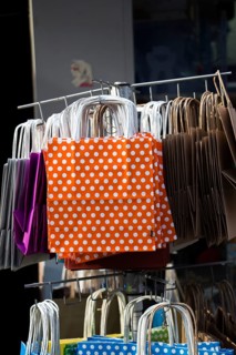 One simple color paper shopping bag in the market place