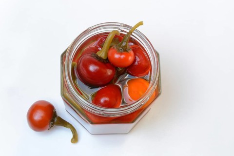 Jarred cherry peppers in vinegar, chilli, paprika