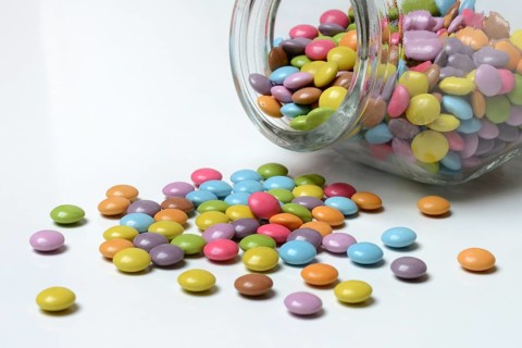 Chocolate lentils with glass container, Smarties