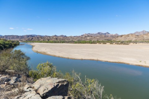 Orange River, also known as the Orange River, on the border between Namibia and South Africa, Oranjemund, Sperrgebiet National Park, also known as Tsau ÇKhaeb National Park, Namibia, Africa