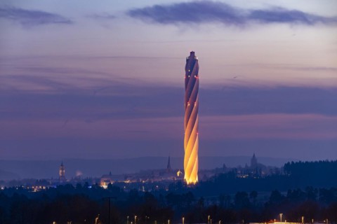 Test tower of TK-Elevator in the early morning. Express and high-speed lifts are tested in the 246-metre-high tower. Behind it, the city with its historic towers and churches. Rottweil, Baden-Wuerttem...