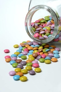 Chocolate lentils with glass container, Smarties