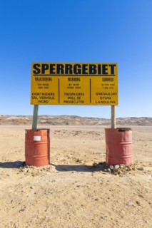 Warning sign at the diamond exclusion zone in the Sperrgebiet National Park, also Tsau ÇKhaeb National Park, Namibia, Africa