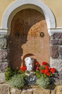 Tomb of Luis Trenker and his woman at the cemetery of Sankt Ulrich, Val Gardena, Dolomites, South Tyrol, Italy, Europe