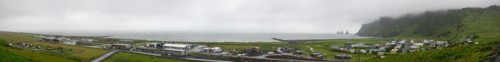 Rain and fog on cliff, in the back rocks Reynisdrangar in the water, Reynisfjara beach, Vik, South Iceland, Iceland, Europe
