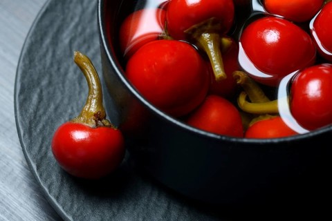 Potted cherry peppers in vinegar, chilli, paprika