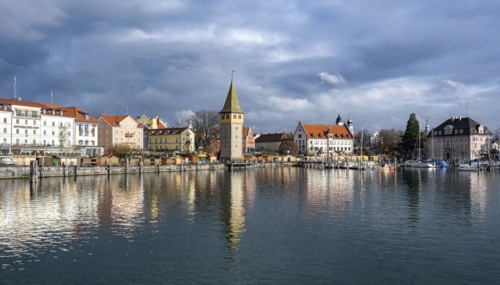Harbour promenade with Mangturm, reflected in the lake, harbour, Lindau Island, Lake Constance, Bavaria, Germany, Europe
