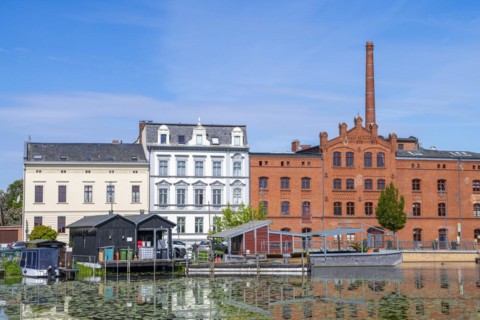 Boathouses, residential buildings and industrial architecture on Muehlendamm, Brandenburg an der Havel, Brandenburg, Germany, Europe