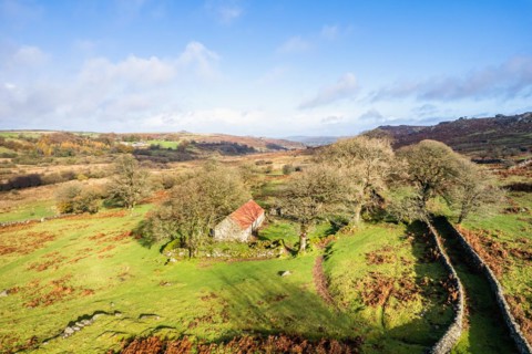 View over Emsworthy Mire from a drone, Haytor Rocks, Dartmoor National Park, Devon, England, UK