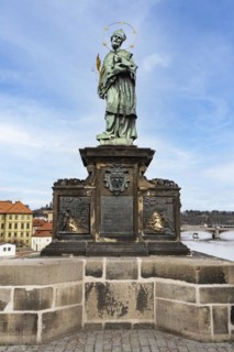 Statue of St. John of Nepomuk on Charles Bridge, Prague, Czech Republic, Europe
