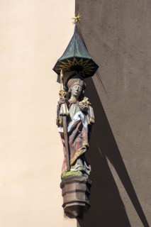 Sculpture of a saint, house figure on a residential building, Albrecht-Duerer-Platz, Nuremberg, Middle Franconia, Bavaria, Germany, Europe