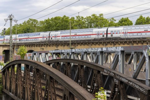 InterCity IC of Deutsche Bahn AG to Zurich on the Gaeubahn, double-decker train on viaduct at Nordbahnhof Stuttgart, Baden-Wuerttemberg, Germany, Europe