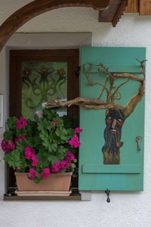 Window decorated with a flower box and a rootstock, Allgaeu, Bavaria, Germany, Europe