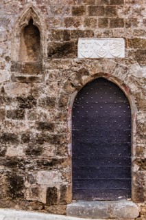 Gate to the Church of the Holy Trinity, Knights Street in Old Town from the time of the Order of St. John, only surviving 16th century street in late Gothic style, Oddos Ippoton, Rhodes Town, Greece, ...