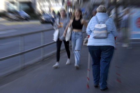 Wiping Picture Woman with Walking Frame