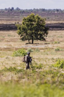 A soldier of the Jaegerbataillo photographed during an exercise of a combat situation at the Bundeswehr Combat Training Centre in Letzlingen, The soldiers wear AGDUS equipment
