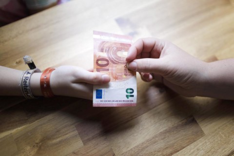 Ten-year-old girl and pocket money, Bonn, Germany, Europe