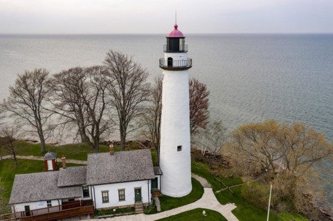 Port Hope, Michigan, The Pointe Aux Barques Lighthouse on Lake Huron. Built in 1857, it is one of the oldest continuously operating Lights on the Great Lakes. It replaced an earlier structure built in...