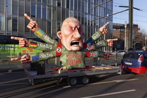 Stop Putin, Demonstration against the Ukraine war on 25.2.23., Mottowagen Karneval with Putin figure by Jacques Tilly, Duesseldorf, North Rhine-Westphalia, Germany, Europe