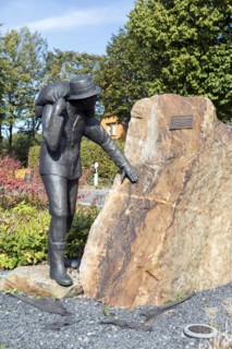 The Smuggler, this monument commemorates the time of coffee smuggling from 1945-1953 at the German-Belgian border, North Eifel, Monschau, North Rhine-Westphalia, North Rhine-Westphalia, Germany, Europ...