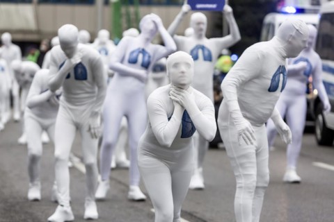 Protest of the environmental organisation Greenpeace, on the Bundesstrasse 14 40 activists demand better air quality, the Neckartor is considered the most polluted street in Germany with high levels o...