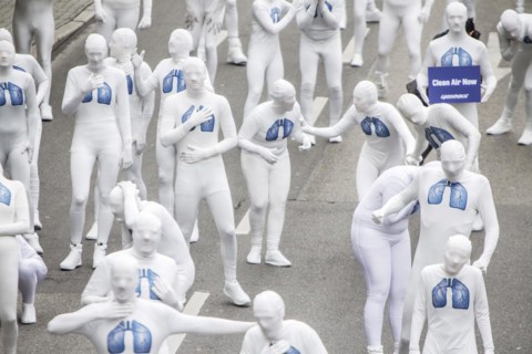 Protest of the environmental organisation Greenpeace, on the Bundesstrasse 14 40 activists demand better air quality, the Neckartor is considered the most polluted street in Germany with high levels o...