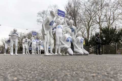 Protest of the environmental organisation Greenpeace, on the Bundesstrasse 14 40 activists demand better air quality, the Neckartor is considered the most polluted street in Germany with high levels o...