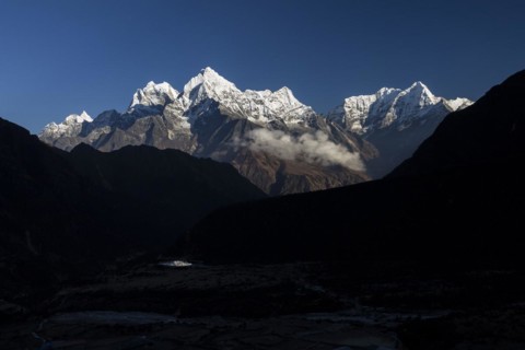 Mountain panorama seen from Thame village on an autumn evening with some high Himalayan peaks, including Malanphulan, Kangtega, Thamserku, Kusum Kanguru. Three Passes Trek. Khumbu, the Everest Region,...