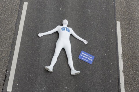 Protest of the environmental organisation Greenpeace, on the Bundesstrasse 14 40 activists demand better air quality, the Neckartor is considered the most polluted street in Germany with high levels o...