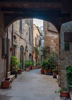 Courtyard with flowerpots, Pitigliano, Tuscany, Italy, Europe