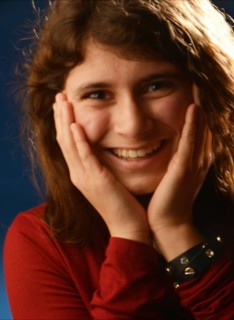An 11-year-old girl stands as a model, Germany, Europe
