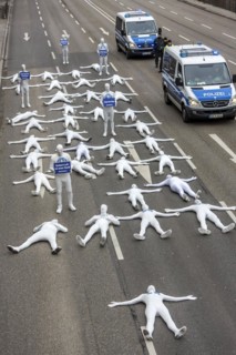 Protest of the environmental organisation Greenpeace, on the Bundesstrasse 14 40 activists demand better air quality, the Neckartor is considered the most polluted street in Germany with high levels o...