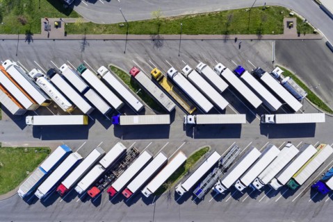 Rest area Denkendorf on the motorway A8, occupied parking spaces for trucks, drivers have to respect their rest periods, drone photo, Denkendorf, Baden-Wuertttemberg, Germany, Europe