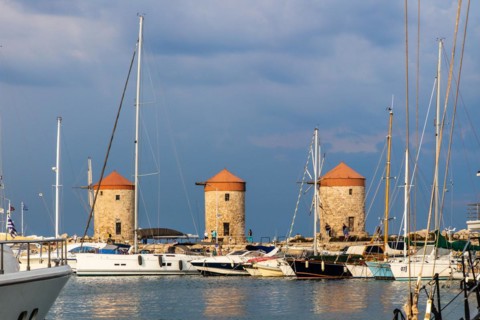 Three windmills on the pier, Mandraki Harbour, Rhodes Town, Greece, Europe