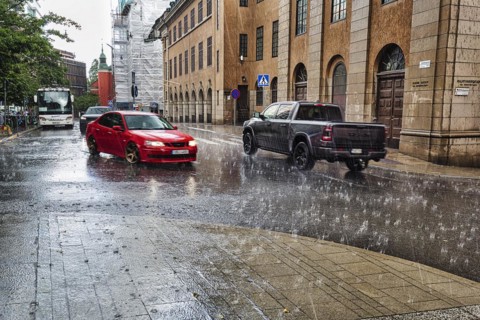 Cars driving in the city centre, downpour, motion blur, Stockholm, Sweden, Europe