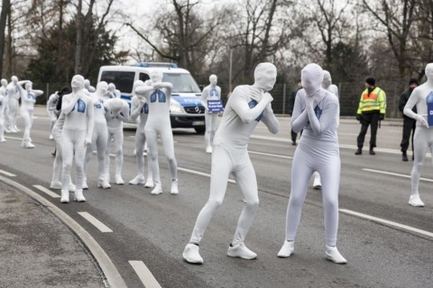 Protest of the environmental organisation Greenpeace, on the Bundesstrasse 14 40 activists demand better air quality, the Neckartor is considered the most polluted street in Germany with high levels o...