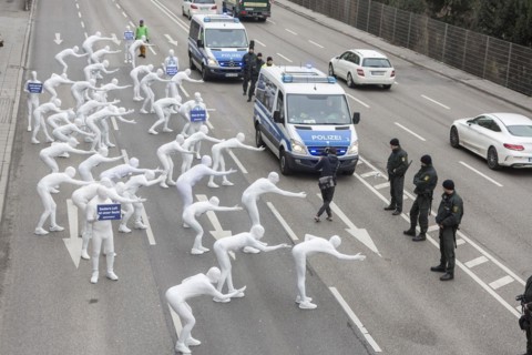 Protest of the environmental organisation Greenpeace, on the Bundesstrasse 14 40 activists demand better air quality, the Neckartor is considered the most polluted street in Germany with high levels o...