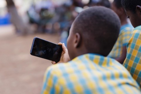 Topic: Child with smartphone in Africa., Krokrobite, Ghana, Africa