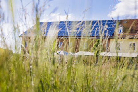 Large inn with solar roof in Bavaria., Baiernrain, Germany, Europe