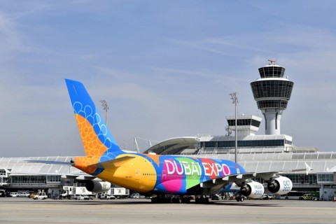 Emirates Airlines special livery Expo Dubai 2021-2022 Airbus A380-800 on position in front of Terminal 1 with tower, Munich Airport, Upper Bavaria, Bavaria, Germany, Europe